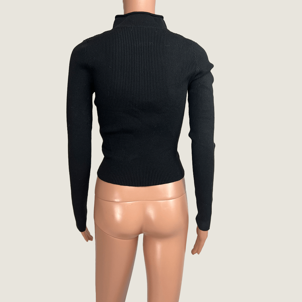 Back view of the Supre black knit jumper