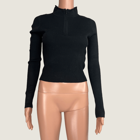 Front view of the Supre black knit jumper