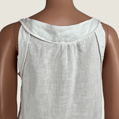 Back close up view of a Sussan white linen sleeveless tank top