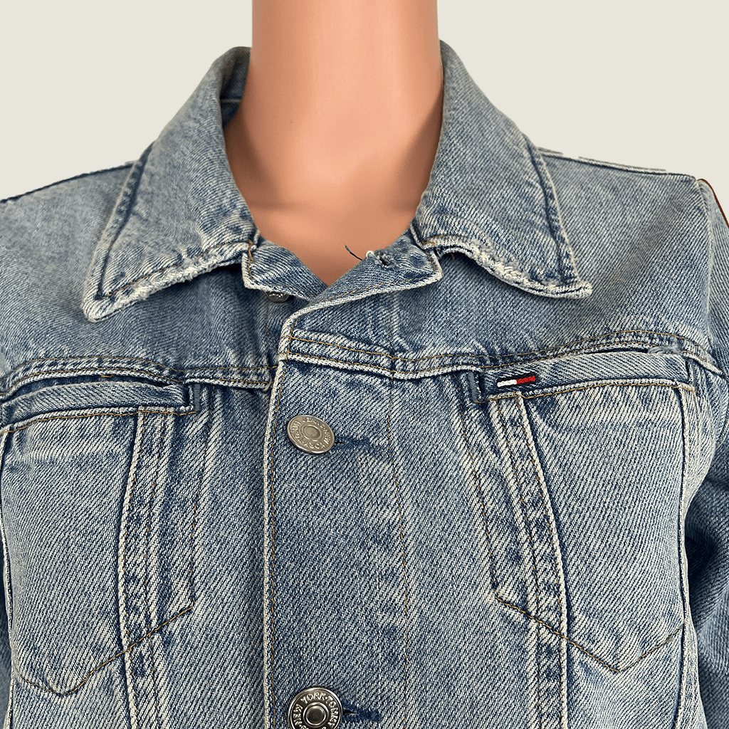 Front Collar Close Up View of The Tommy Jeans Denim Jacket Logo Tape Sleeve