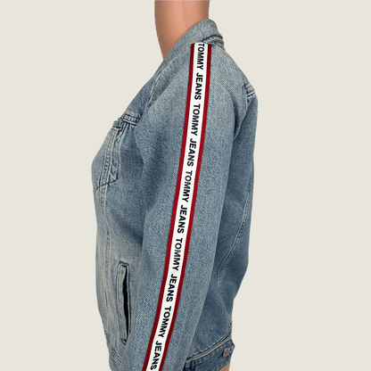 Sleeve Close Up View of The Tommy Jeans Denim Jacket Logo Tape Sleeve