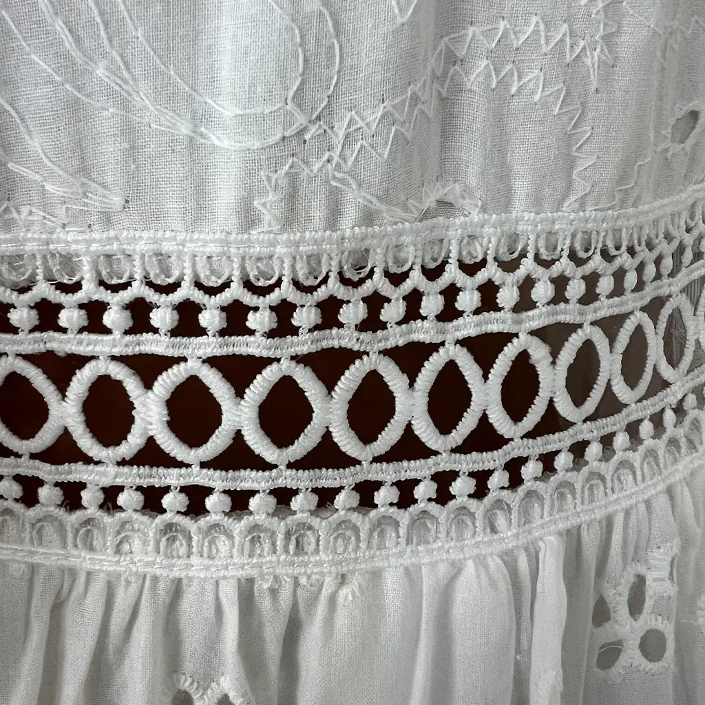 Front Waist Detail View of a White Lace Summer Midi Dress 