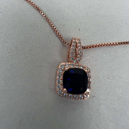 Gold filled with Cubic Zirconias and blue stone pendant