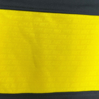 Boys Nike dri-fit top yellow detail