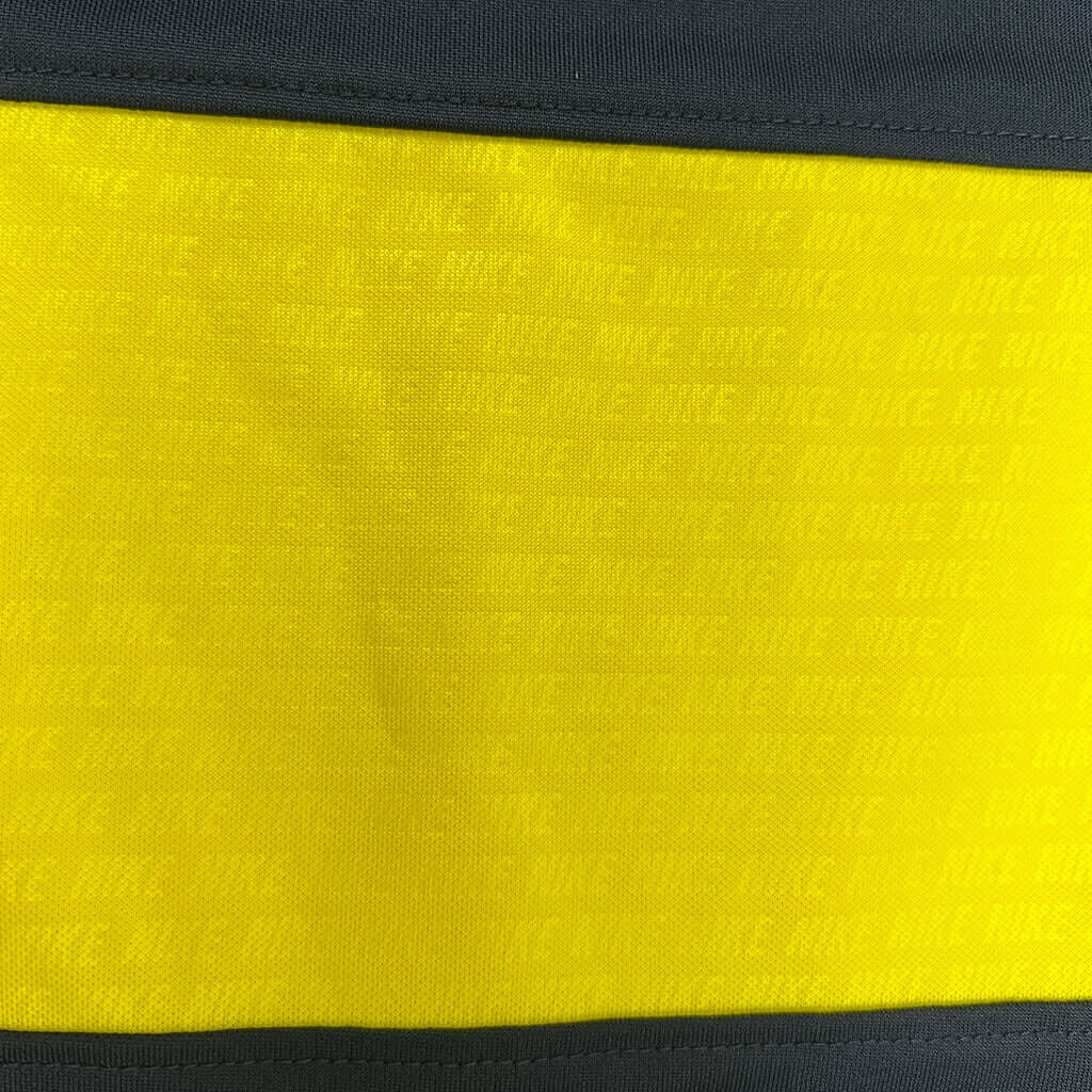 Boys Nike dri-fit top yellow detail