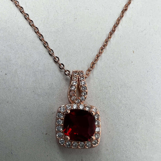 Gold chain red CZ stone detail