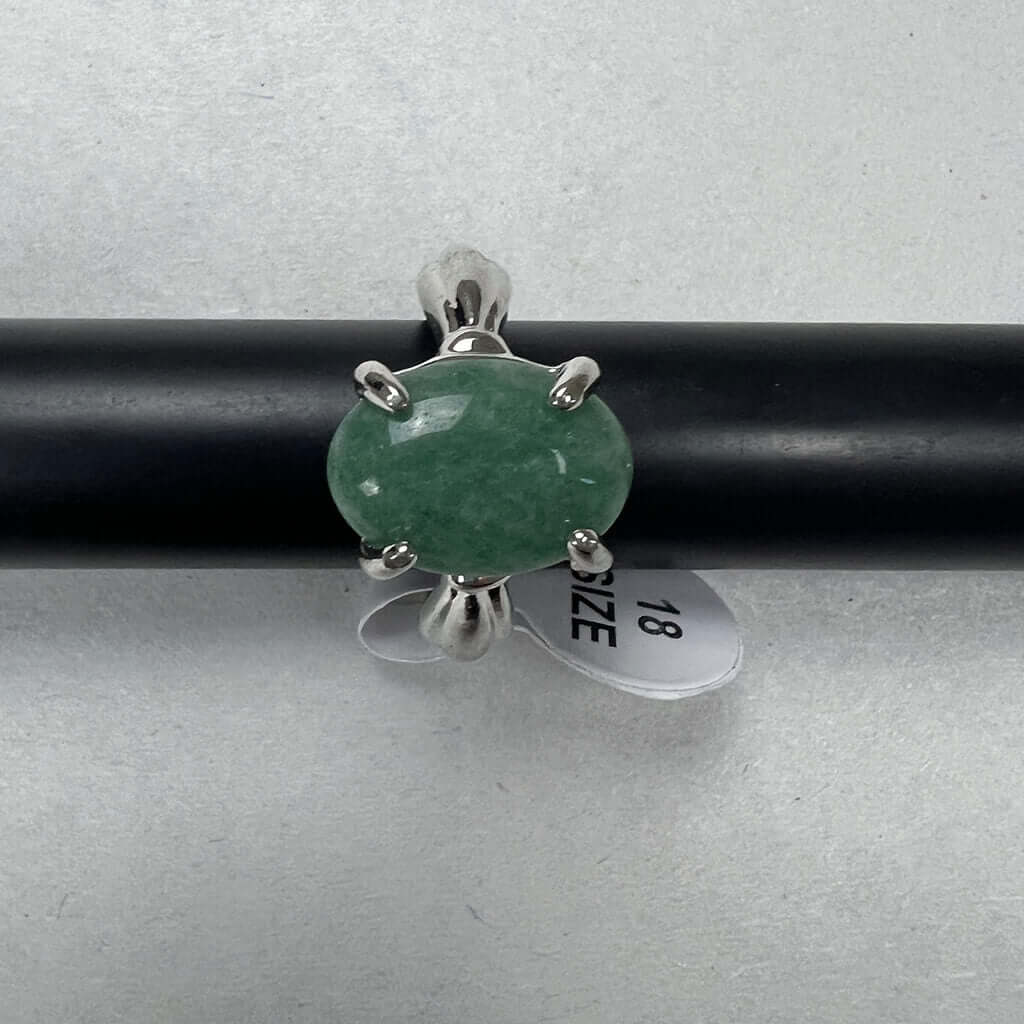 Silver Rings With Green Stones Above