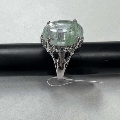 Silver Ring with Stone Green thru it