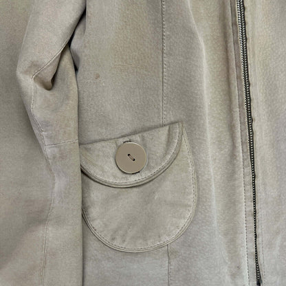 Papaya suede jacket pocket detail