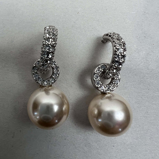 Crystal Drop Earrings With Pearl Feature on white