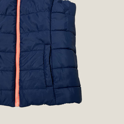 Girls reversable puffer vest blue detail