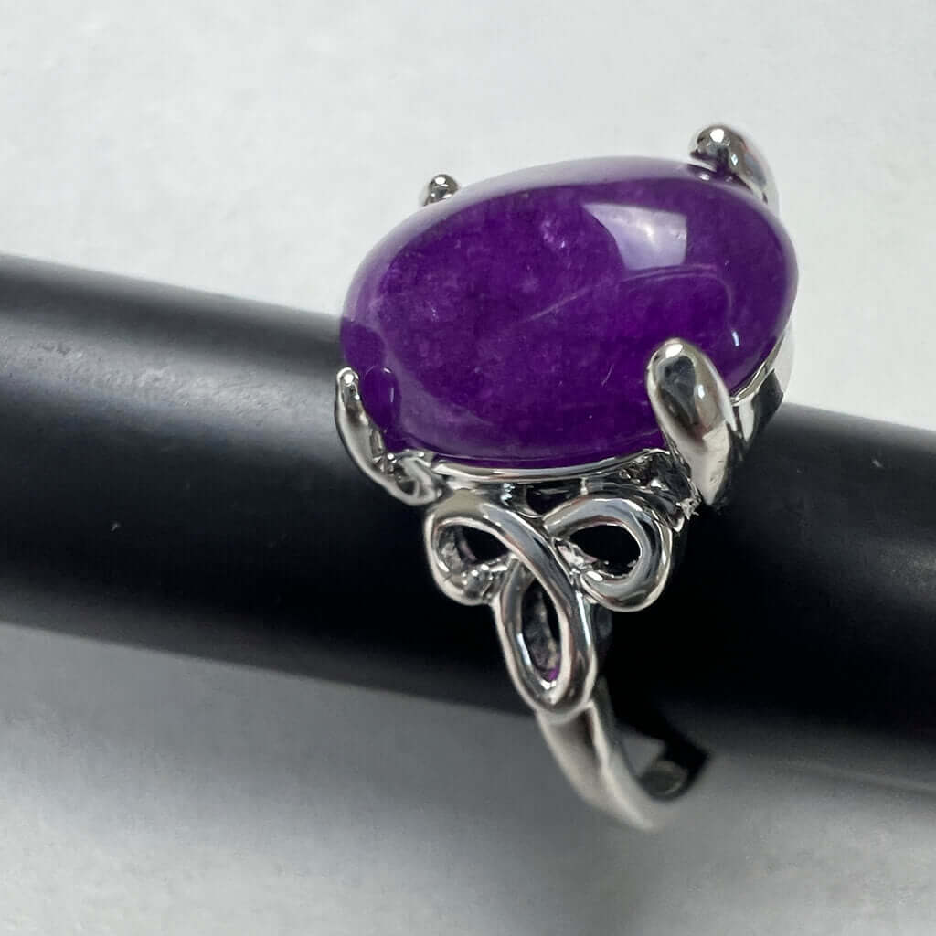 Silver Rings With Purple Stones Above
